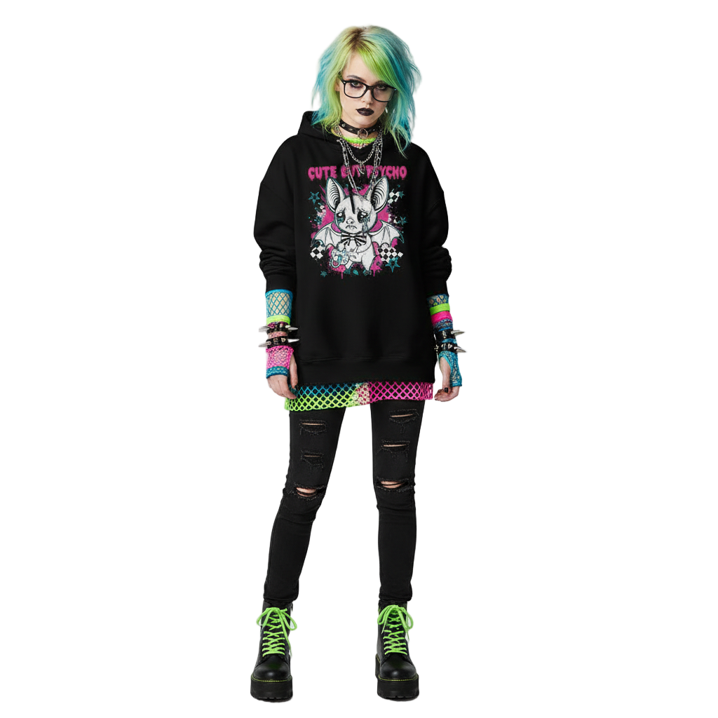 Person wearing a black hoodie with a graphic design, black pants, and green shoes on a white background