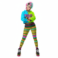 Person wearing a colorful outfit with striped leggings and a bright jacket on a white background